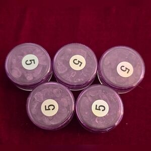 Set Of Five Purple Plastic Containers Filled With Amethyst Chips